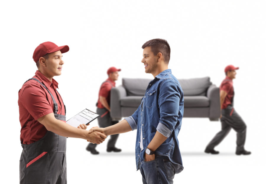 A happy man shaking hands with a mover